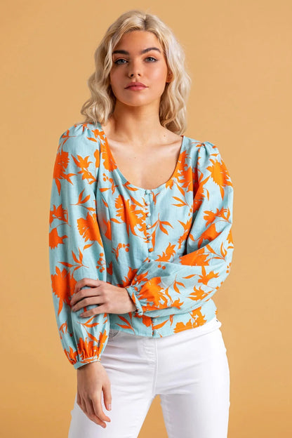 ROMA | Blusa con estampado floral y botones naranjas