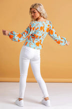 ROMA | Blusa con estampado floral y botones naranjas